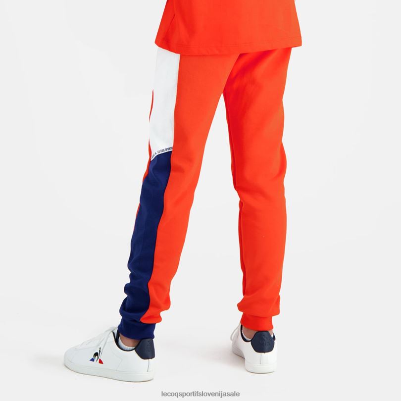 otroci oblačila Le Coq Sportif hlače oranžne 60J4R642